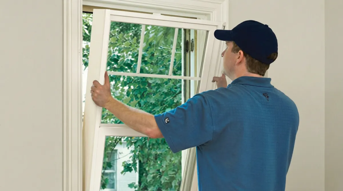 Professional contractors performing a residential window insulation and replacement service in Stockton, CA